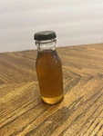 Antique Nos Thomas A. Edison Battery Oil Bottle Full Bloomfield Nj. Fixed Price $19.99.