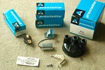 Wisconsin Engines YQ23 Tune-up Kit & 28IGB1065 Distributor Cap. Fixed Price $69.50.
