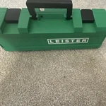 Leister Triac Hot Air Tool Heat Gun With Carry Case, Mpn 141.228. Fixed Price $500.00.