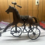 1800S Horse Tricycle Antique Wood And Iron Pedal. Fixed Price $300.00.