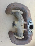 Wisconsin VH4D Manifold (1-32). Fixed Price $165.00.