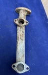 Maytag Engine Model 72 Exhaust Manifold Twin Original Part. Fixed Price $10.00.