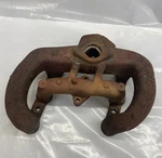 Wisconsin Manifold VH4D **broken** Intake / Exhaust. Fixed Price $30.00.