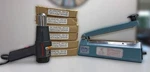 Shrink Wrapping Set - Milwaukee Heat Gun, Hualian Sealer, 4,000 Bags. Fixed Price $120.00.