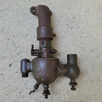 The Schebler Vintage Brass Carburetor Cushman Hit Miss Gas Binder Engine. Fixed Price $125.00.