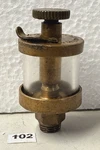 Essex Brass Co No 00 Oiler Hit Miss Gas Engine Antique 2 1/4" Tall. Fixed Price $49.99.
