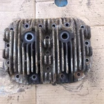 AB86A Wisconsin Cast Iron Cylinder Head (good Threads See Photos). Fixed Price $125.00.