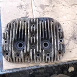 AB86A Wisconsin Cast Iron Cylinder Head (good Threads See Photos). Fixed Price $125.00.