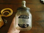 Vintage Universal Top Oiler Advertising Glass Bottle Engine Collectbile. Fixed Price $95.00.